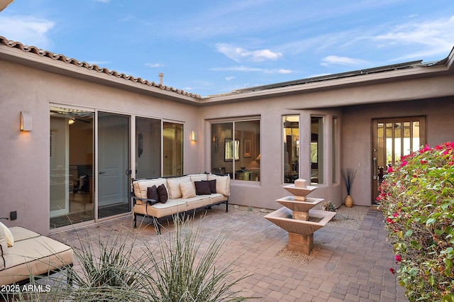 view of patio / terrace with an outdoor hangout area