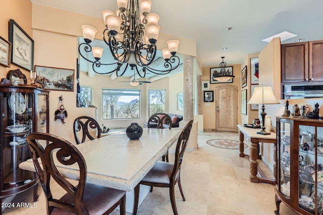 dining room with a notable chandelier