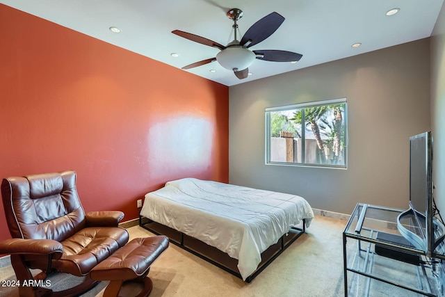 carpeted bedroom featuring ceiling fan