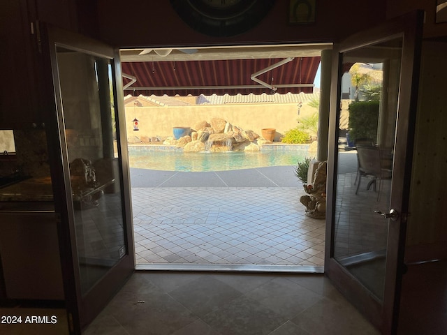 entryway featuring french doors