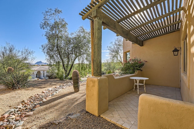 view of patio / terrace featuring a pergola