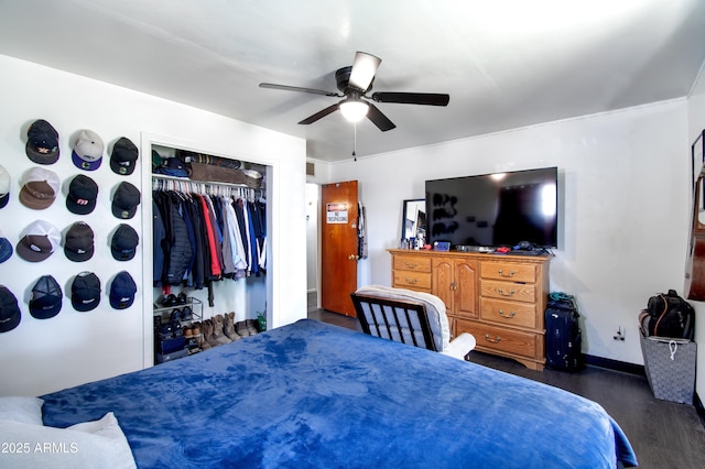 706 E Roosevelt Ave, Buckeye, AZ 85326 - bedroom featuring wood finished floors, baseboards, a ceiling fan, and a closet
