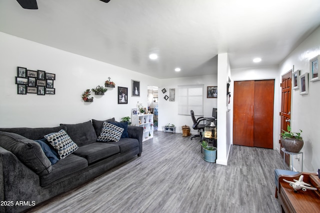 706 E Roosevelt Ave, Buckeye, AZ 85326 - living room with wood finished floors, recessed lighting, and baseboards