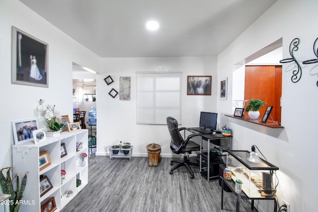 706 E Roosevelt Ave, Buckeye, AZ 85326 - office featuring wood finished floors and baseboards
