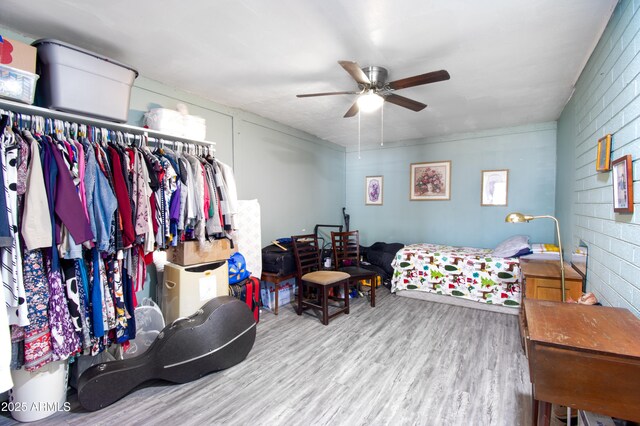 706 E Roosevelt Ave, Buckeye, AZ 85326 - bedroom with wood finished floors and a ceiling fan