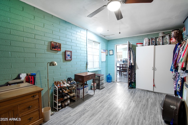 706 E Roosevelt Ave, Buckeye, AZ 85326 - miscellaneous room featuring light wood-style floors and ceiling fan