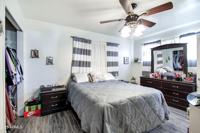 706 E Roosevelt Ave, Buckeye, AZ 85326 - bedroom with wood finished floors, ceiling fan, and a closet