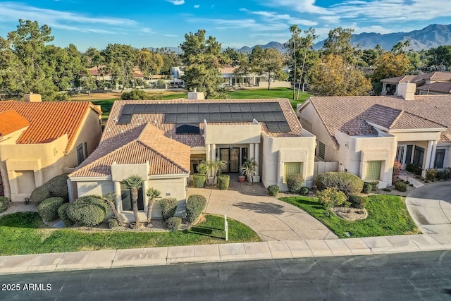 view of front of property with a mountain view