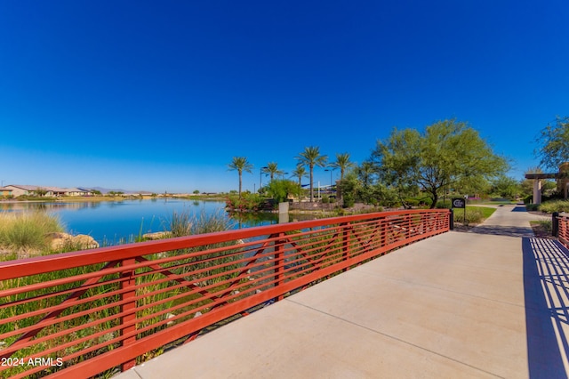 view of home's community with a water view