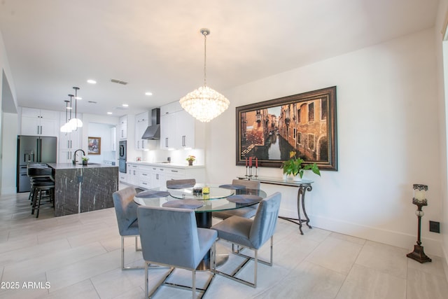 16772 W Cypress St, Goodyear, AZ 85395 - dining space with a chandelier, baseboards, recessed lighting, and light tile patterned flooring