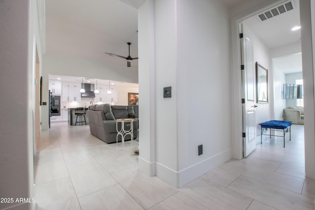 16772 W Cypress St, Goodyear, AZ 85395 - hall featuring light tile patterned floors and baseboards