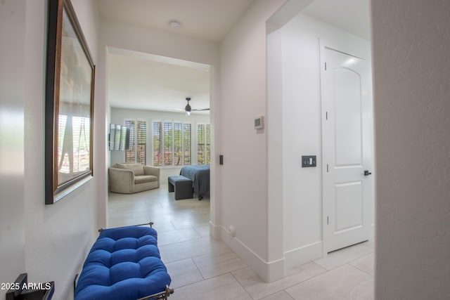 16772 W Cypress St, Goodyear, AZ 85395 - corridor with light tile patterned floors and baseboards