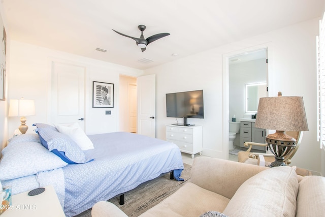 16772 W Cypress St, Goodyear, AZ 85395 - bedroom with connected bathroom and a ceiling fan
