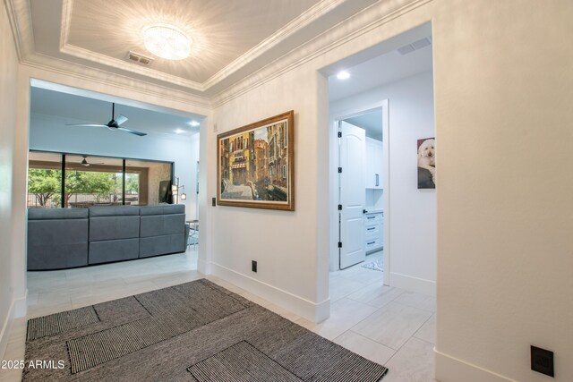 16772 W Cypress St, Goodyear, AZ 85395 - hallway featuring ornamental molding, tile patterned flooring, and baseboards