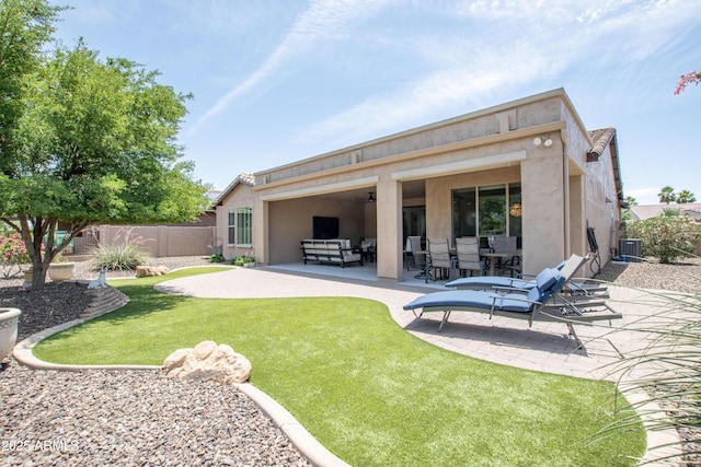 16772 W Cypress St, Goodyear, AZ 85395 - back of house with a patio, stucco siding, and central AC
