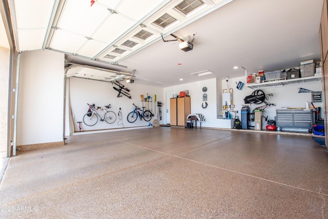 16772 W Cypress St, Goodyear, AZ 85395 - garage featuring a garage door opener and water heater