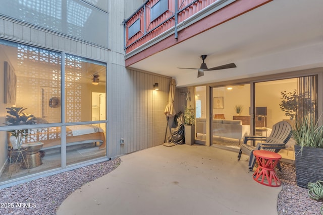 view of patio / terrace featuring ceiling fan