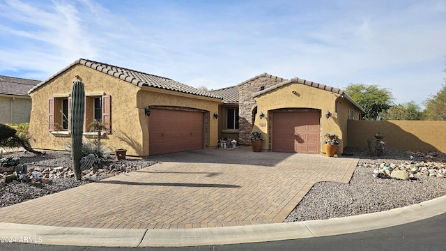 view of front of house with a garage