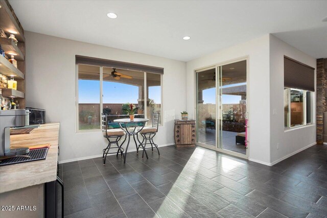 dining room with ceiling fan