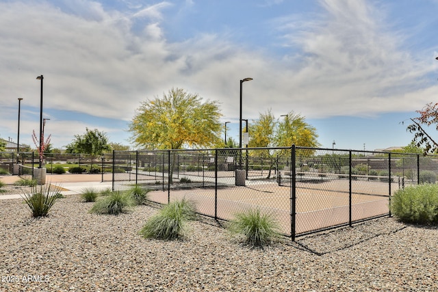 view of property's community with fence