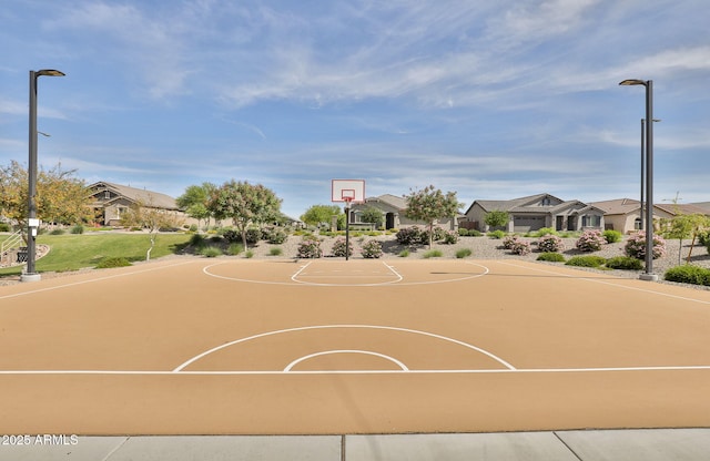 view of sport court with a residential view and community basketball court