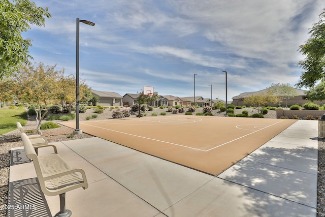 view of property's community featuring a residential view and community basketball court