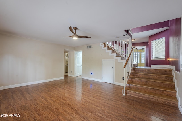 533 N Cobblestone St, Gilbert, AZ 85234 - unfurnished living room featuring stairway, a ceiling fan, wood finished floors, and baseboards