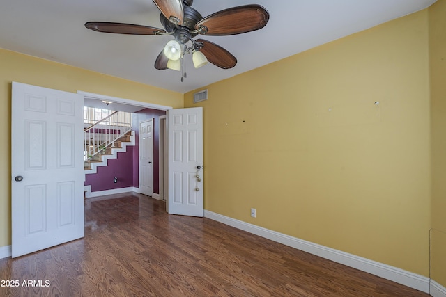 533 N Cobblestone St, Gilbert, AZ 85234 - empty room featuring stairs, baseboards, wood finished floors, and ceiling fan
