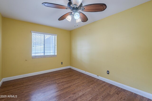 533 N Cobblestone St, Gilbert, AZ 85234 - unfurnished room with wood finished floors, baseboards, and a ceiling fan
