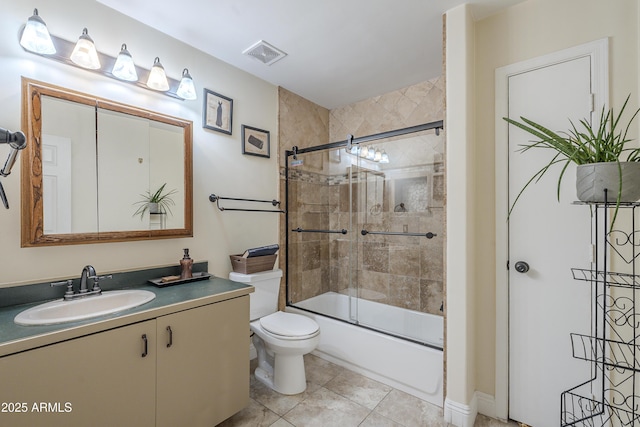 533 N Cobblestone St, Gilbert, AZ 85234 - bathroom featuring vanity, toilet, bath / shower combo with glass door, and tile patterned flooring