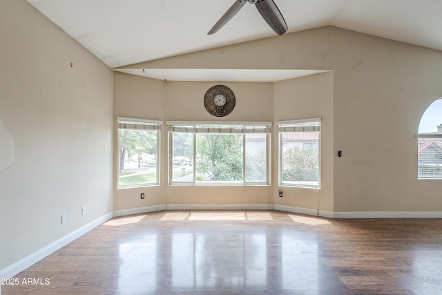 533 N Cobblestone St, Gilbert, AZ 85234 - spare room featuring vaulted ceiling, ceiling fan, wood finished floors, and baseboards