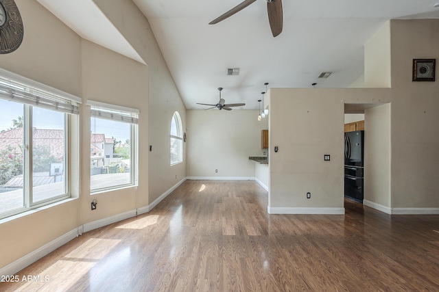 533 N Cobblestone St, Gilbert, AZ 85234 - unfurnished living room featuring ceiling fan, wood finished floors, baseboards, and high vaulted ceiling