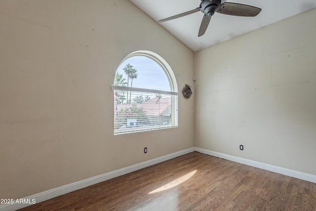 533 N Cobblestone St, Gilbert, AZ 85234 - unfurnished room featuring wood finished floors, ceiling fan, baseboards, and vaulted ceiling