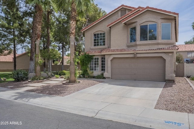 533 N Cobblestone St, Gilbert, AZ 85234 - mediterranean / spanish-style home with a tiled roof, stucco siding, driveway, and an attached garage