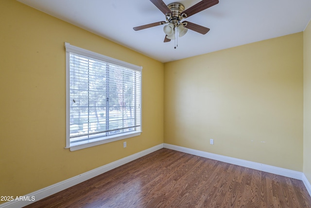 533 N Cobblestone St, Gilbert, AZ 85234 - empty room with healthy amount of natural light, wood finished floors, baseboards, and ceiling fan