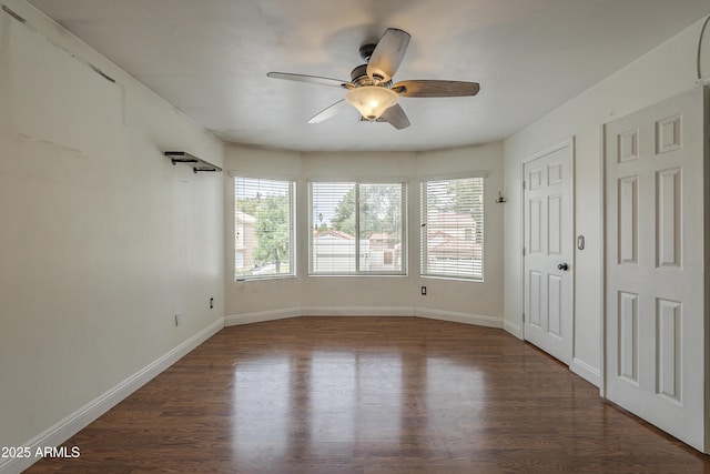 533 N Cobblestone St, Gilbert, AZ 85234 - empty room with a ceiling fan, wood finished floors, and baseboards