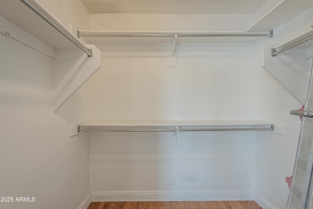 533 N Cobblestone St, Gilbert, AZ 85234 - spacious closet with wood finished floors