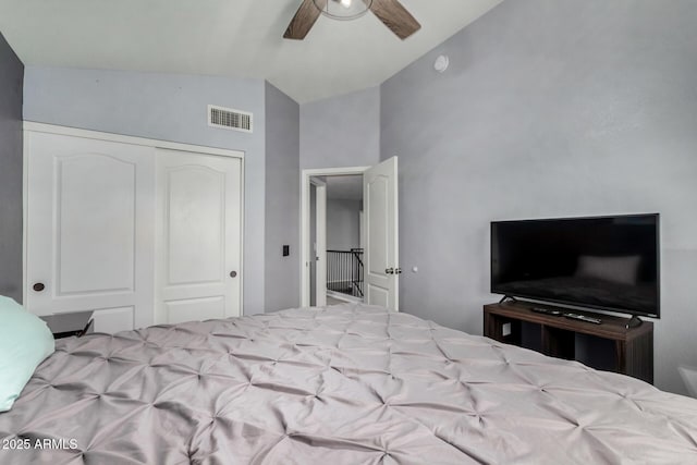 2934 S Woodruff Cir, Mesa, AZ 85212 - bedroom with a closet, vaulted ceiling, and ceiling fan