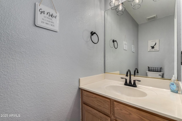 2934 S Woodruff Cir, Mesa, AZ 85212 - bathroom with a textured wall and vanity