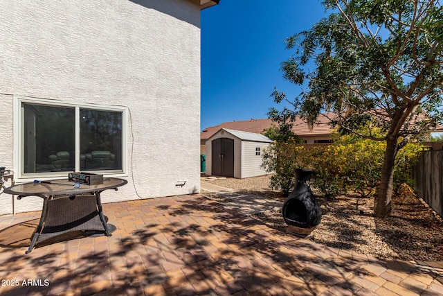2934 S Woodruff Cir, Mesa, AZ 85212 - fenced backyard with a storage unit and a patio