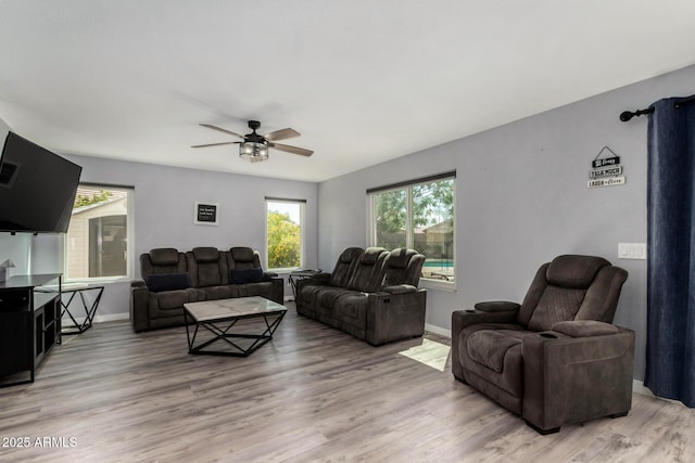2934 S Woodruff Cir, Mesa, AZ 85212 - living area with ceiling fan and light wood finished floors
