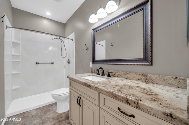 17429 W Red Bird Rd, Surprise, AZ 85387 - bathroom featuring vanity, a shower, and toilet