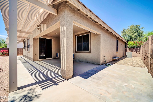 17429 W Red Bird Rd, Surprise, AZ 85387 - back of house featuring central air condition unit, a patio, a fenced backyard, and stucco siding