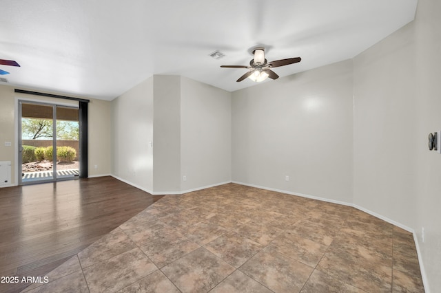 17429 W Red Bird Rd, Surprise, AZ 85387 - spare room featuring a ceiling fan, baseboards, and visible vents