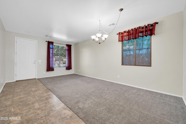 17429 W Red Bird Rd, Surprise, AZ 85387 - carpeted spare room featuring visible vents, baseboards, an inviting chandelier, and tile patterned flooring