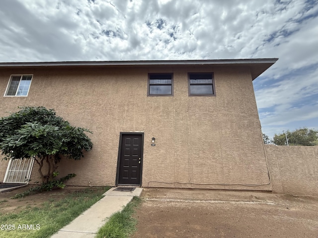 4231 N 69th Dr Unit 1297, Phoenix, AZ 85033 - view of front facade featuring stucco siding