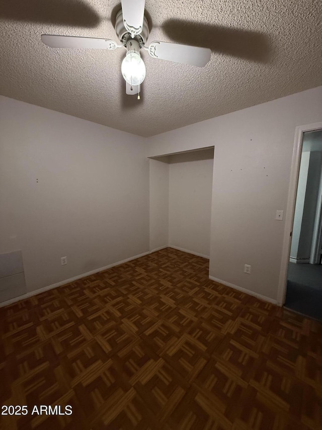 4231 N 69th Dr Unit 1297, Phoenix, AZ 85033 - unfurnished room featuring ceiling fan and a textured ceiling