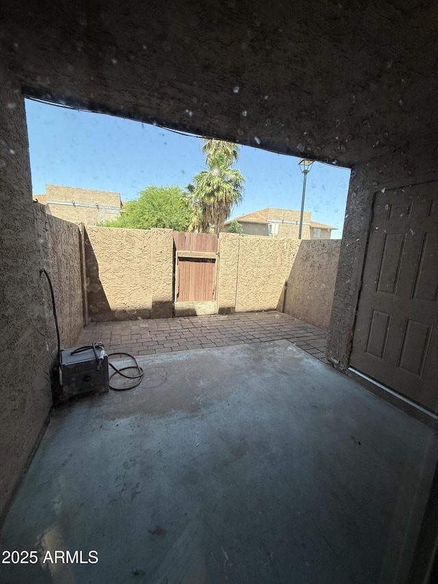 4231 N 69th Dr Unit 1297, Phoenix, AZ 85033 - view of patio / terrace with a fenced backyard