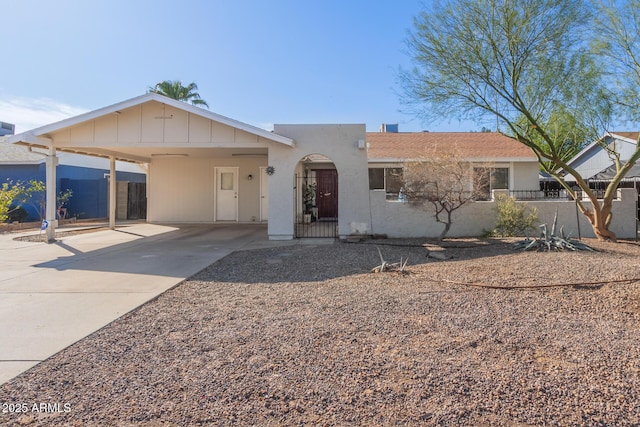 single story home with a carport