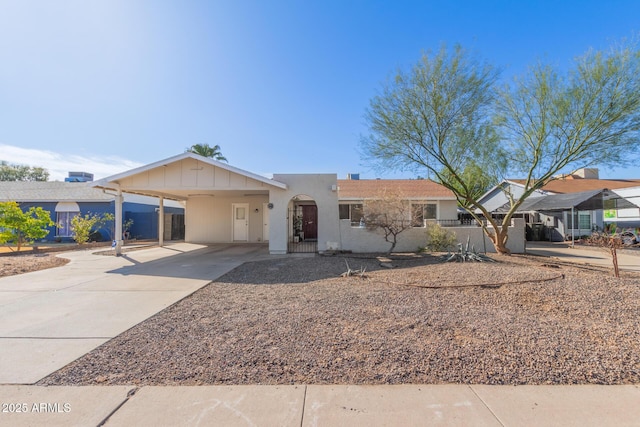 single story home featuring a carport